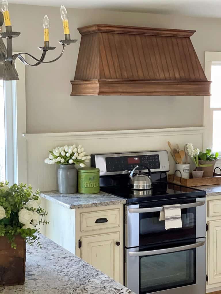 Before and after farmhouse kitchen renovation with general finishes gel stain