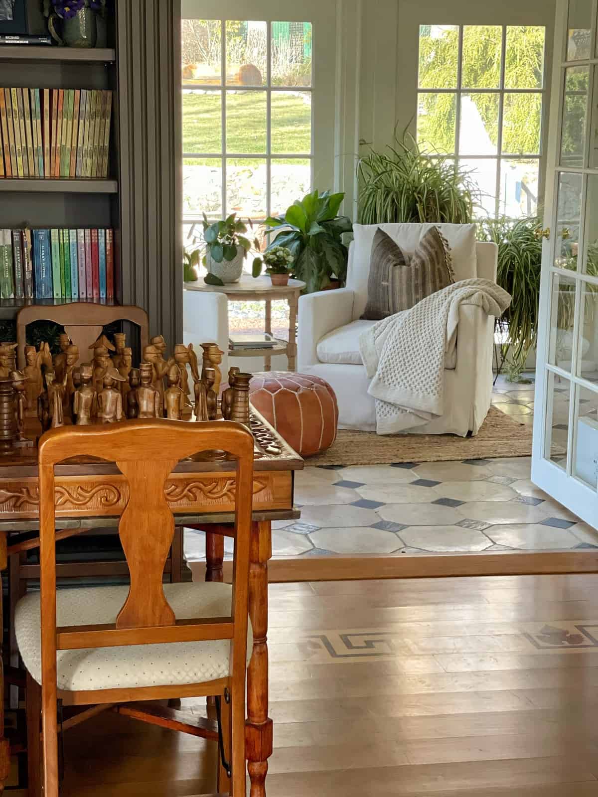 vintage wood chess table in the library overlooking the plant room