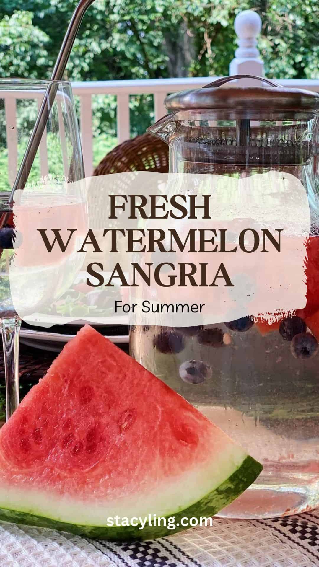 A close-up of a glass pitcher filled with fresh watermelon sangria, blueberries, and glasses on a table. A watermelon slice is in the foreground. Text reads: &ldquo;Fresh Watermelon Sangria For Summer.&rdquo; Try this easy recipe for watermelon sangria!.