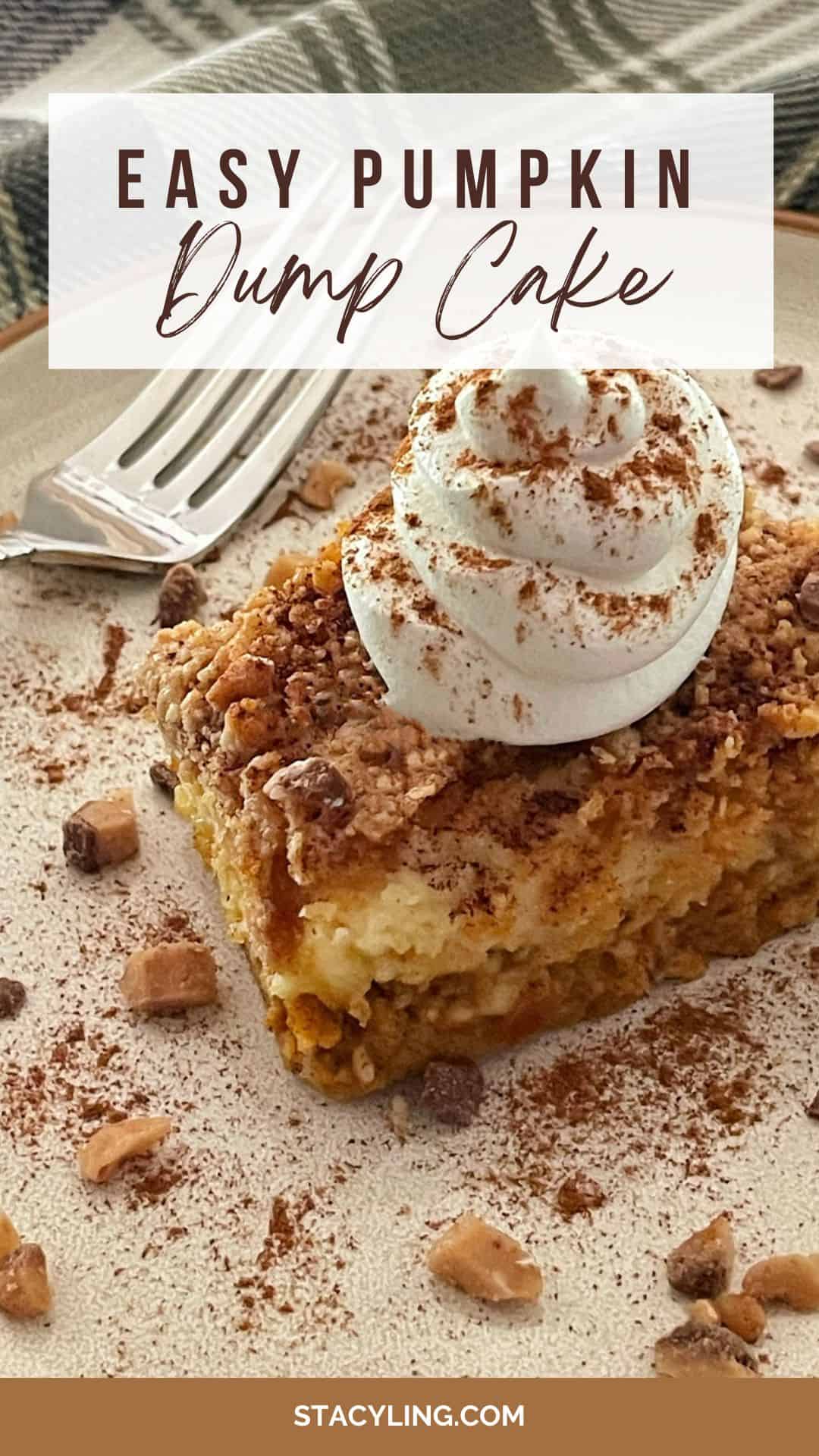 A slice of pumpkin dump cake topped with whipped cream and sprinkled with cinnamon sits on a plate with a fork, surrounded by small toffee bits. The text overlay reads "Easy Pumpkin Dump Cake.