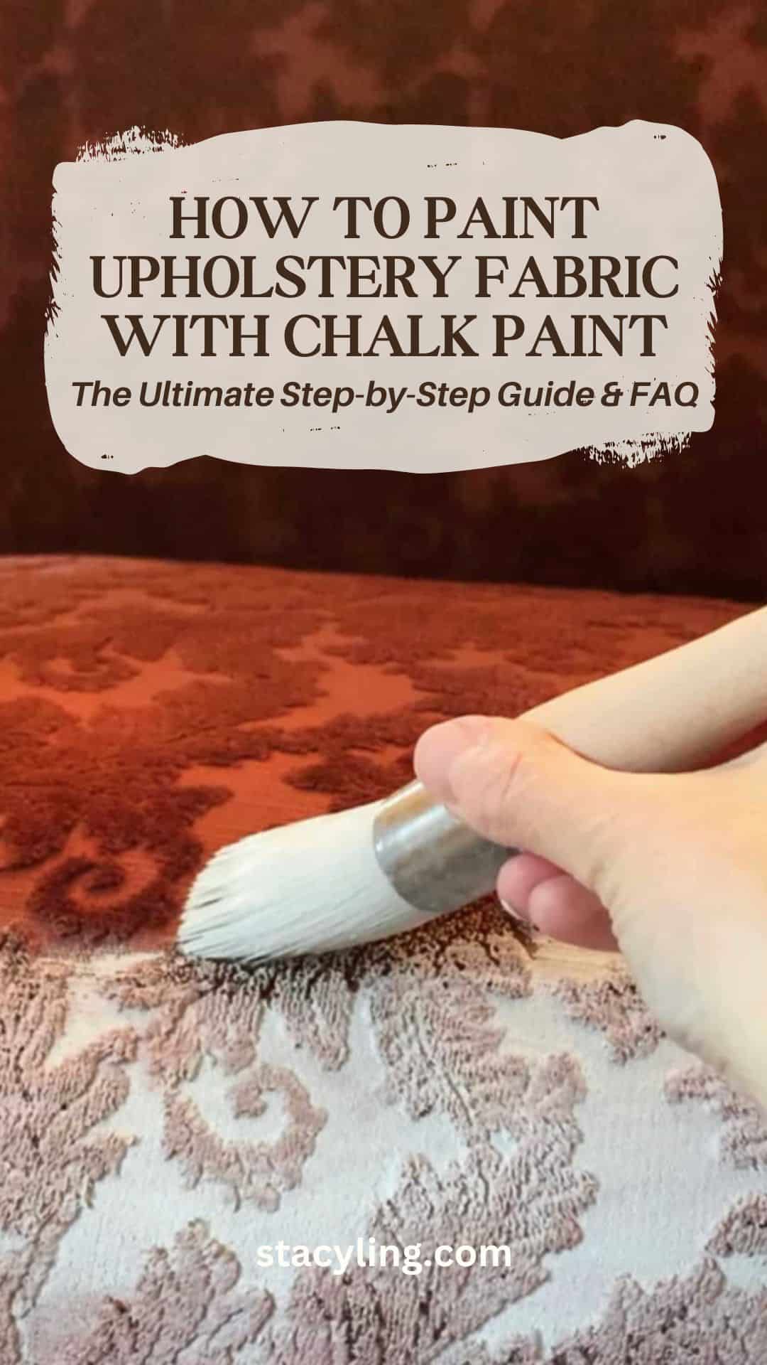 A hand uses a paintbrush to apply chalk paint to reddish-brown patterned upholstery fabric. Text reads: "How to paint upholstery fabric with chalk paint. The ultimate step-by-step guide & FAQ." Website: stacyling.com.