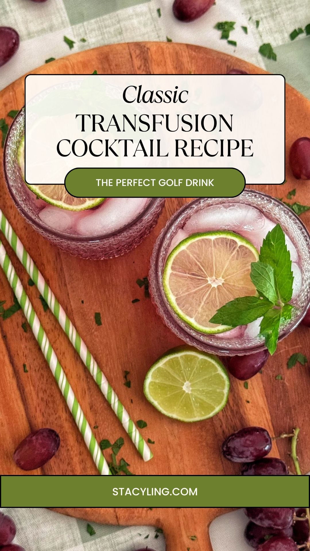 Two glasses of a transfusion cocktail with ice, lime slices, and mint rest on a wooden board, surrounded by green-striped straws, grapes, chopped herbs, and additional lime slices. Text overlay reads: “Classic Transfusion Cocktail Recipe.”.